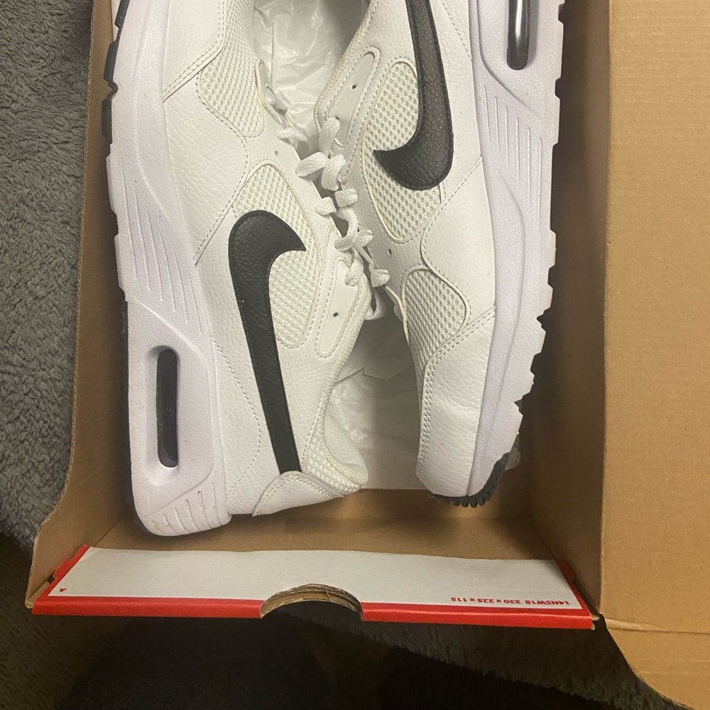 White and black Nike jogging shoes great condition never worn